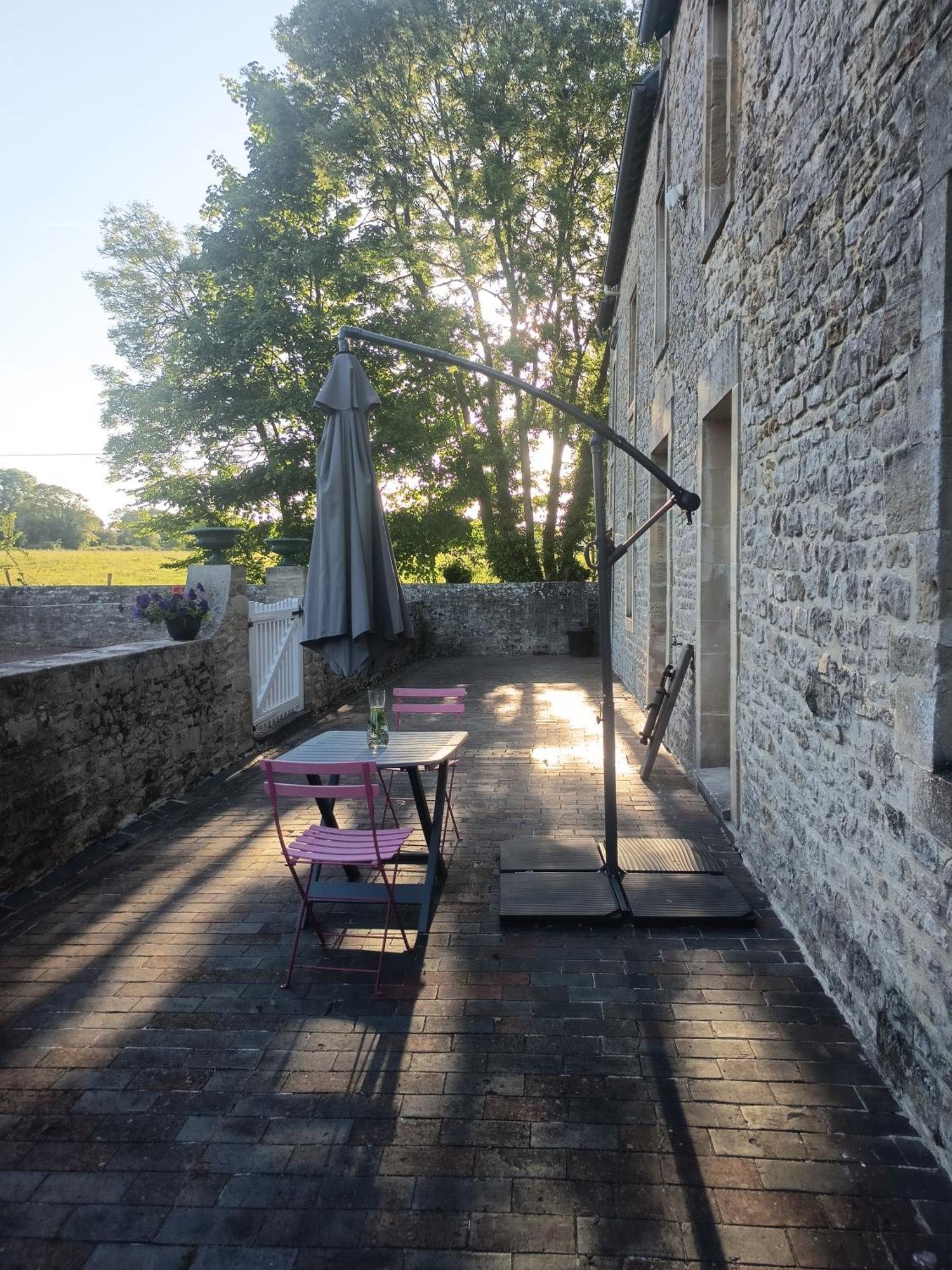 Maison De Charme Tour-en-Bessin Esterno foto
